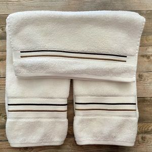 Two hand towels and 3 washcloths, brand new, never used.
